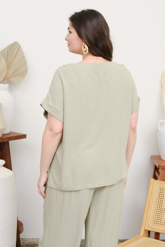 Linen-blend cropped top + wide-leg pants.