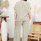 Linen-blend cropped top + wide-leg pants.